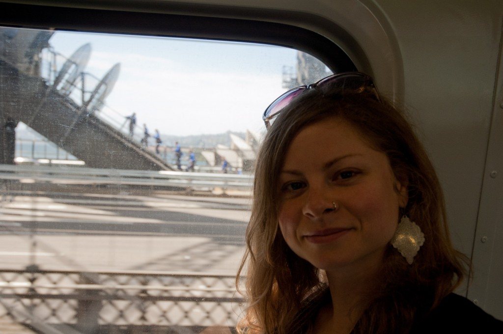111225.111517 Train over the Harbour Bridge w/ Opera House in window